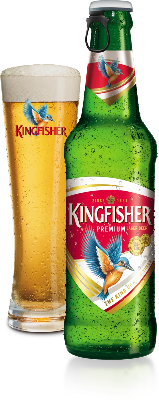 A bottle of Kingfisher Premium Lager next to a freshly poured glass